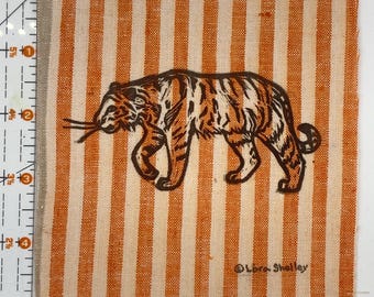 Tiger Patch hand printed linocut by Lora Shelley