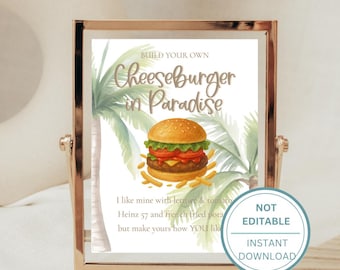 May include: A framed print with a gold-colored border features a watercolor illustration of a cheeseburger with fries, palm trees, and the text "Cheeseburger in Paradise." Additional text includes "Build Your Own" and "Not Editable, Instant Download."