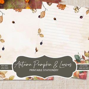 May include: Two sheets of printable stationery featuring watercolor illustrations of autumn leaves, berries, and pumpkins. One sheet is blank, and the other has horizontal lines. The text reads Autumn Pumpkin & Leaves, PDF AND JPG FILES, US LETTER AND A4 SIZE.