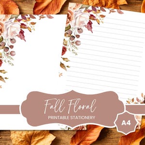 May include: Two sheets of A4 printable stationery featuring watercolour floral arrangements in the top corners. One sheet is blank, and the other contains horizontal lines. The floral design includes white, peach, and deep red roses with brown leaves.