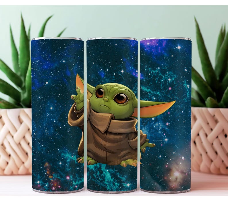 May include: Three stainless steel tumblers featuring a galaxy print and a green alien character from the Star Wars franchise. The alien is wearing a brown robe and has large eyes.
