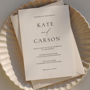 May include: A set of three ceramic mugs with a speckled, matte finish. The mugs are in shades of cream, light gray, and dark gray. Each mug has a simple, minimalist design, perfect for coffee or tea.