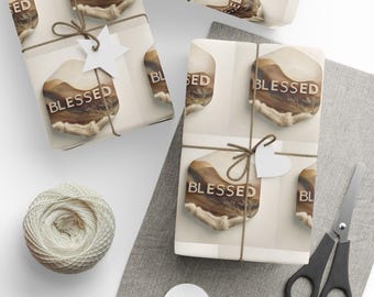 May include: Gift-wrapped presents with the word "BLESSED" printed on the wrapping paper. The gifts are tied with twine and adorned with white paper tags. A ball of twine, scissors, and blank tags are also visible.