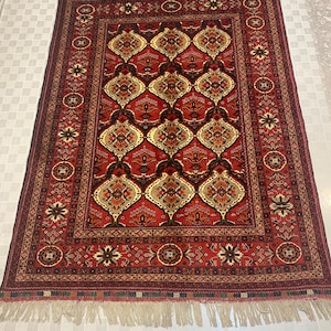 Handwoven Afghan Wool Rug: Vintage Tribal Design, 6.6x5 ft