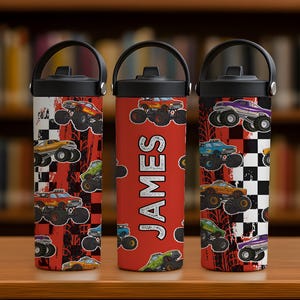 May include: Three insulated water bottles with black lids and handles. The bottles feature a monster truck design on a red and white background. One bottle has the name "JAMES" in white.