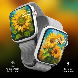 May include: Two white Apple Watches with gray bands displaying a sunflower painting as the watch face. The time is 12:30 and the day is Tuesday 26th.