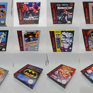 Op de afbeelding: Een verzameling Nintendo-videogameboxen, met titels als "Dragonball", "Punch-Out!!", "RoboCop" en "Star Wars". De dozen tonen kleurrijke graphics en speltitels, met klassieke videogamekunst. De games komen uit de jaren 80 en 90.