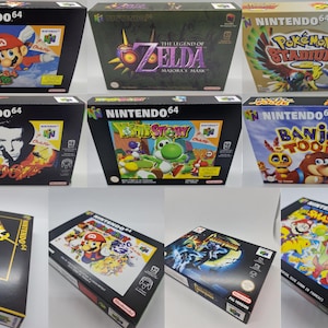 Puede incluir: Colección de cajas de juegos de Nintendo 64, incluyendo títulos como Super Mario 64, The Legend of Zelda: Majora's Mask y Pokémon Stadium. Las cajas negras presentan arte colorido y el logo de Nintendo 64.