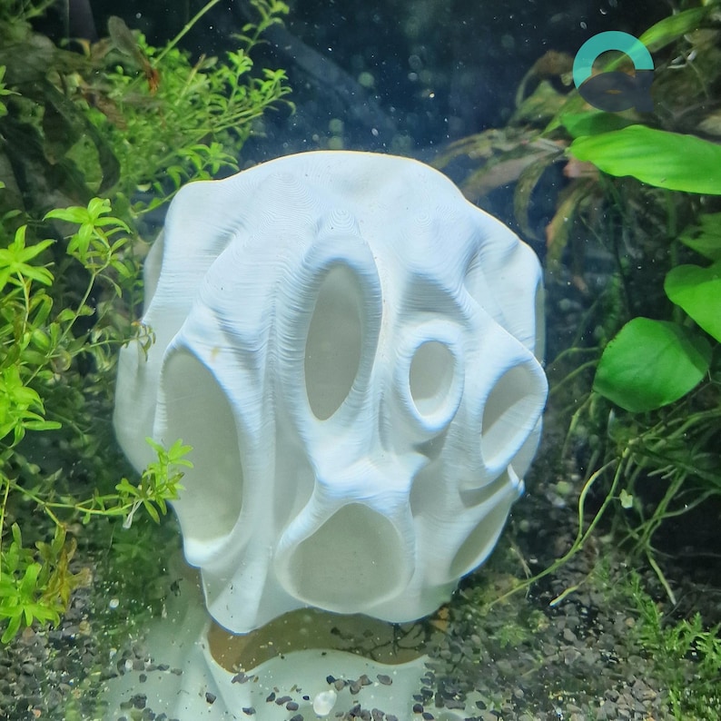 3D printable aquarium fish cave with maze-like tunnels, ideal for nano fish, cichlids, and plecos. Provides shelter and exploration opportunities while enhancing aquarium decor. Safe, functional, and customizable size options.