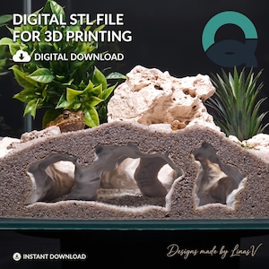 May include: A digital STL file for 3D printing featuring a textured, beige, rock-like reptile hide with multiple arched openings. The design includes a smooth white interior and a rough exterior, displayed with green foliage and a small brown frog.