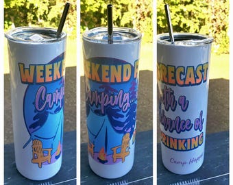 May include: White stainless steel tumbler with a blue and purple camping scene and the text "Weekend Forecast: Camping with a chance of drinking. Camp Happy".