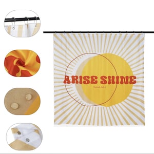 May include: A white shower curtain with a yellow sun and a red moon with the text "Arise Shine" and "Isaiah 60:1" in red letters. The background is a white and yellow striped pattern.