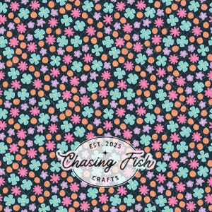 May include: A floral pattern featuring a dark navy background with a grid overlay. The design includes pink, light blue, and orange flowers, along with orange dots. The text "Chasing Fish Crafts" is displayed in a white oval, with "EST. 2025" above.