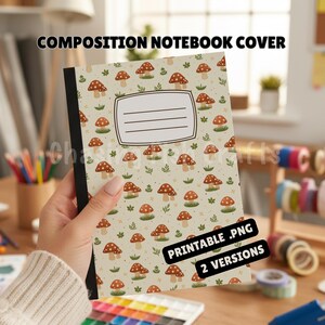 May include: Composition notebook cover featuring a repeating pattern of brown mushrooms with white spots and green grass on a beige background. The notebook has a black spine and a blank label for the owner's name. The text "COMPOSITION NOTEBOOK COVER" is at the top.