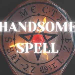 May include: A red candle burns in the center of a black pentagram on a brown octagonal surface. The text "HANDSOME SPELL" is written in white letters above the pentagram.