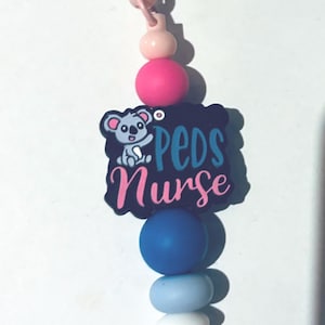 Pediatric nurse badge reel