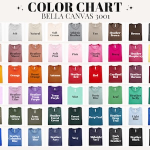 Pu&ograve; includere: Tabella colori di magliette Bella Canvas 3001 in vari colori, tra cui bianco, nero e tonalit&agrave; di blu, verde e rosa. Ogni maglietta &egrave; piegata con cura, con il nome del colore stampato.