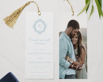 May include: Save the date bookmark with a blue and white design. The bookmark features a photo of a couple and the text "Save the Date". The bookmark also includes the names Kirsten Sullivan and Johnathan Ross, the date Saturday, the 10th of June, and the location Austin, Texas.