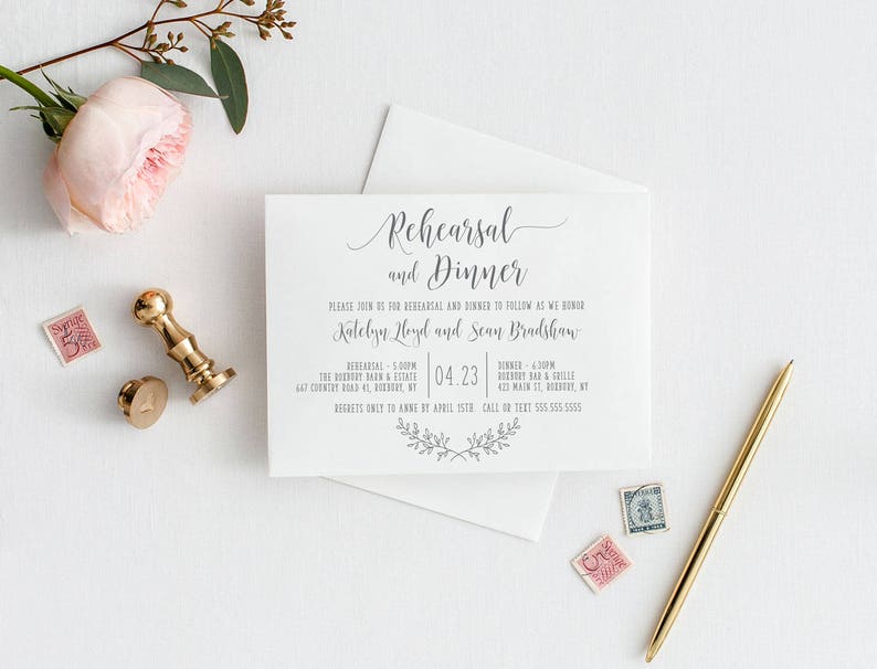 May include: A white wedding rehearsal dinner invitation with gray text. The invitation reads "Rehearsal and Dinner" and includes the names "Katelyn Heyd and Sean Bradshaw". The invitation also includes the date and time of the rehearsal and dinner, as well as the location.