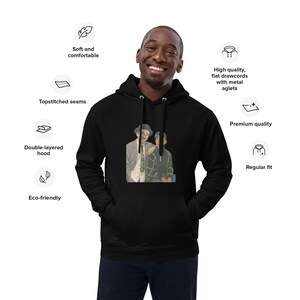 May include: Black hoodie with a graphic of two figures in suits. The hoodie has a double-layered hood, topstitched seams, and flat drawcords with metal aglets. The design also highlights the hoodie's eco-friendly and premium quality.