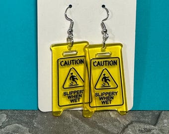 Caution Slippery When Wet Sign Dangle Earrings: Quirky Statement Jewelry