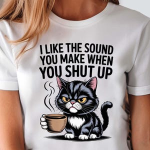 Funny coffee-themed design with moody cat character.