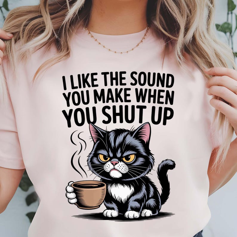 Black and white kitty illustration with coffee and attitude.