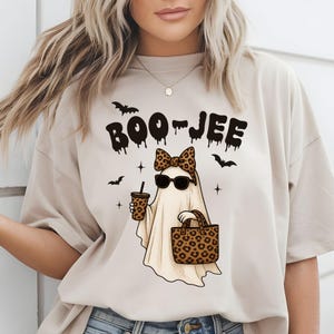 Leopard bow ghost with drink and handbag clipart
