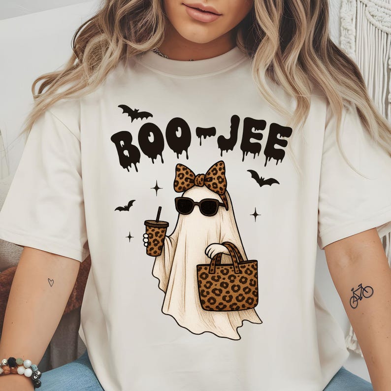 Halloween ghost wearing sunglasses, bow, and holding a purse