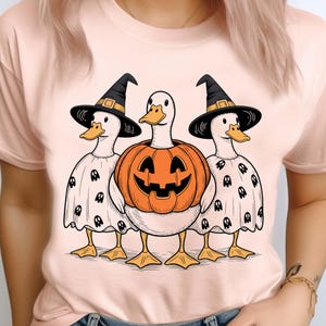 Whimsical Halloween Ducks PNG – Ghost Capes, Witches, and Pumpkin Fun