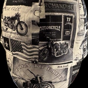 May include: A black and white motorcycle-themed cap. The cap features various motorcycle illustrations, the American flag, and text including "CUSTOM MOTORCYCLES", "RIDE HARD", and "BORN TO RIDE". The design is a collage of motorcycle-related imagery.