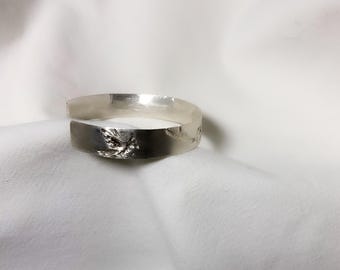Cardinal bracelet hand engraved in silver