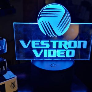 Vestron Video #1 VHS Collector LED Sign – Retro Video Store RGB Light –  Edge Lit Display for Media Rooms & Desktops