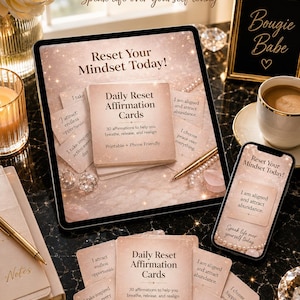 May include: A set of Daily Reset Affirmation Cards with a rose gold gradient background. The cards feature text including 'Daily Reset Affirmation Cards', '30 affirmations to help you breathe, release, and realign', and 'Printable + Phone Friendly'.