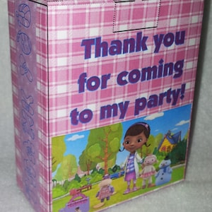 May include: A pink and white checkered box with the text "Thank you for coming to my party!" on the front. The box features a cartoon image of Doc McStuffins and her friends.