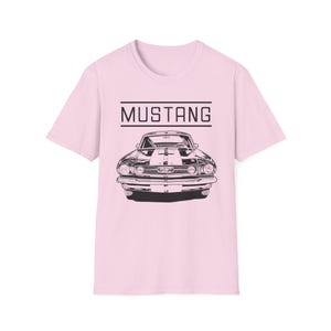 Vintage Ford Mustang T-shirt exuding a retro vibe, perfect for car enthusiasts and vintage lovers. This unisex T-shirt, made from 100% ring-spun cotton, offers a lightweight and comfortable fit for all-year wear. With a classic crew neckline and vers