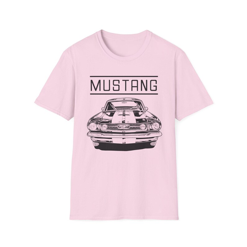 Vintage Ford Mustang T-shirt exuding a retro vibe, perfect for car enthusiasts and vintage lovers. This unisex T-shirt, made from 100% ring-spun cotton, offers a lightweight and comfortable fit for all-year wear. With a classic crew neckline and vers