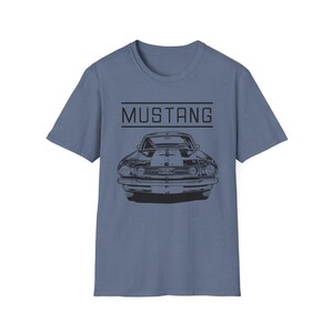 Vintage Ford Mustang T-shirt exuding a retro vibe, perfect for car enthusiasts and vintage lovers. This unisex T-shirt, made from 100% ring-spun cotton, offers a lightweight and comfortable fit for all-year wear. With a classic crew neckline and vers