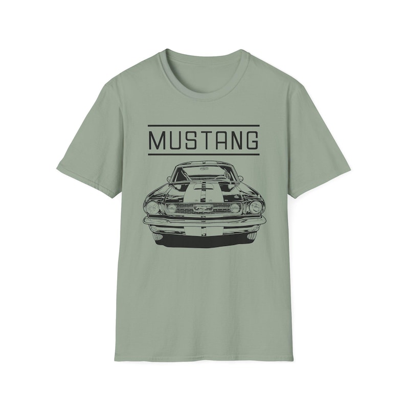 Vintage Ford Mustang T-shirt exuding a retro vibe, perfect for car enthusiasts and vintage lovers. This unisex T-shirt, made from 100% ring-spun cotton, offers a lightweight and comfortable fit for all-year wear. With a classic crew neckline and vers