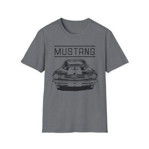 Vintage Ford Mustang T-shirt exuding a retro vibe, perfect for car enthusiasts and vintage lovers. This unisex T-shirt, made from 100% ring-spun cotton, offers a lightweight and comfortable fit for all-year wear. With a classic crew neckline and vers