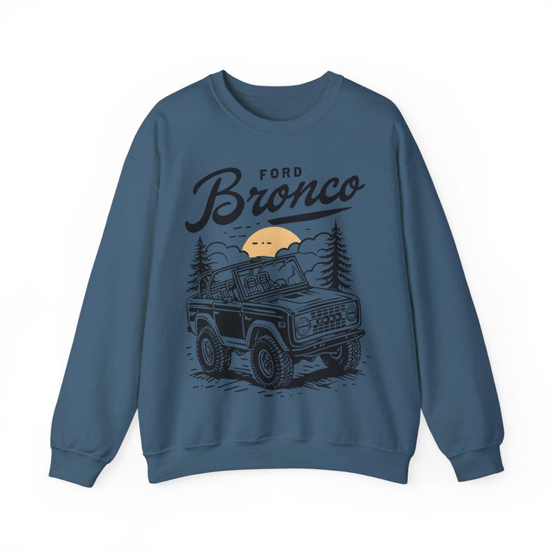The Ford Bronco Adventure Sweatshirt exudes a sense of adventure and ruggedness, perfect for outdoor enthusiasts and fans of the iconic vehicle. This cozy sweatshirt is made with a medium-heavy fabric blend of 50% cotton and 50% polyester, providing