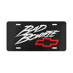 This Bad Bowtie Chevrolet Vanity Plate is perfect for car enthusiasts looking to add a personalized touch to their vehicles. The vibrant colors and unique design make it a great addition to your car's front or back license plate. Ideal for Chevrolet