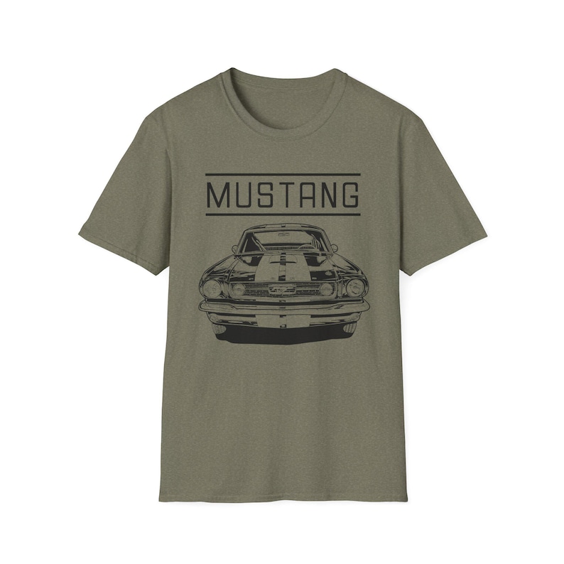 Vintage Ford Mustang T-shirt exuding a retro vibe, perfect for car enthusiasts and vintage lovers. This unisex T-shirt, made from 100% ring-spun cotton, offers a lightweight and comfortable fit for all-year wear. With a classic crew neckline and vers