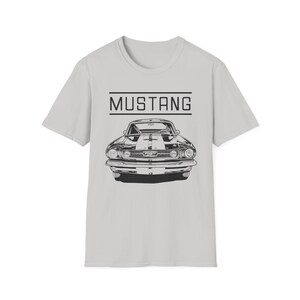 Vintage Ford Mustang T-shirt exuding a retro vibe, perfect for car enthusiasts and vintage lovers. This unisex T-shirt, made from 100% ring-spun cotton, offers a lightweight and comfortable fit for all-year wear. With a classic crew neckline and vers