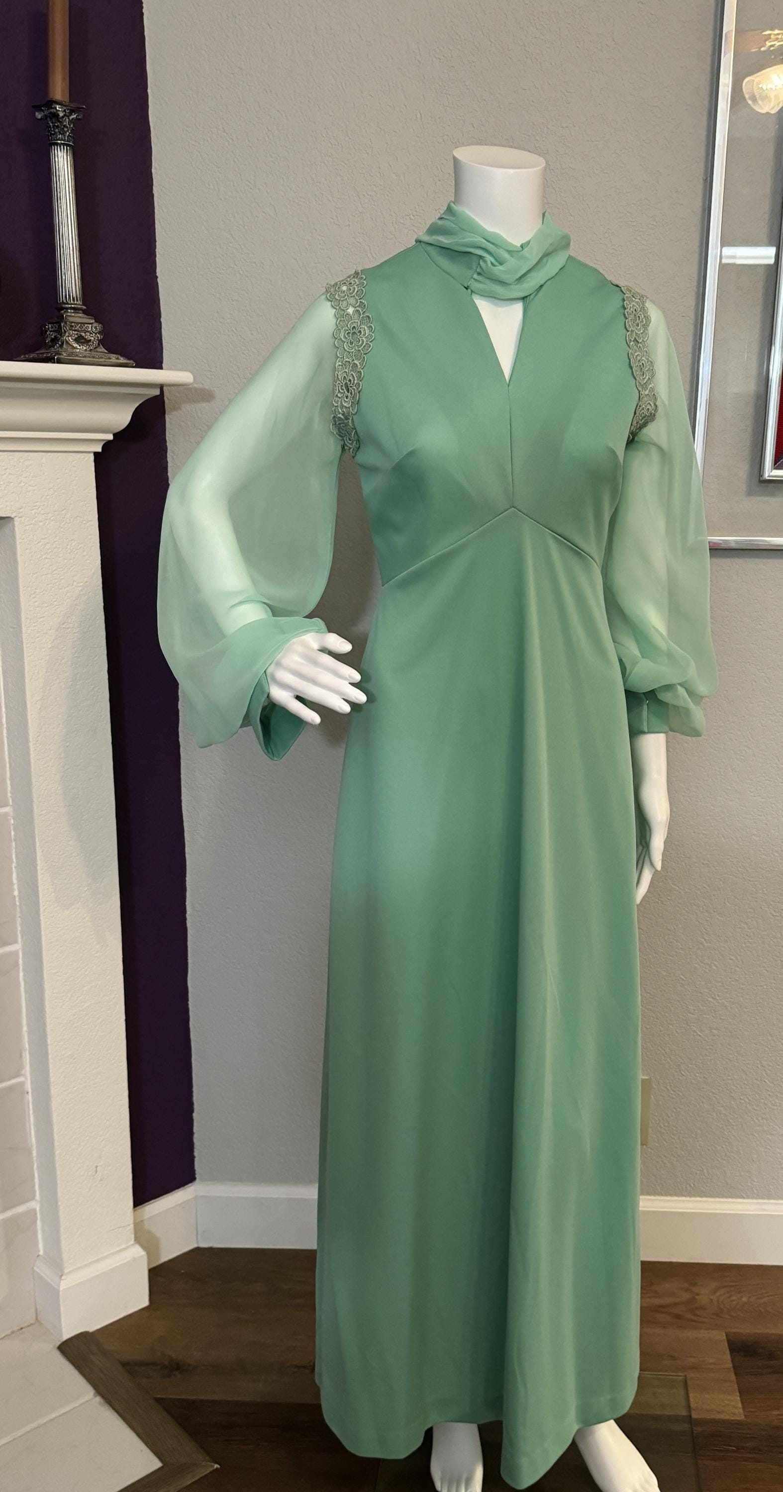 Mint Green Long Sleeves Formal Dress - Gown with Chiffon Arms, Sheer Sleeves, and Embroidered Flowers Mint Green Long Sleeves Formal Dress - Gown with Chiffon Arms, Sheer Sleeves, and Embroidered Flowers