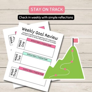 May include: White Weekly Goal Review sheets with pink and teal accents, and a green mountain sticker with a pink flag. The text reads "Stay on Track" and "Check in weekly with simple reflections."