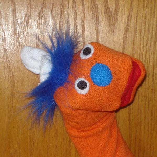 orange long sock puppet theater perform interactive