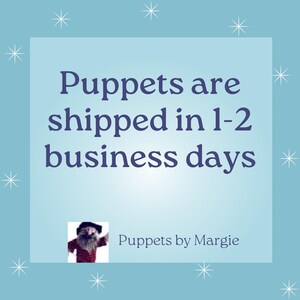 May include: A light blue square graphic with white star accents featuring the dark blue text Puppets are shipped in 1-2 business days. Below the text is a small square image of a puppet with a beard and hat, followed by the text Puppets by Margie.