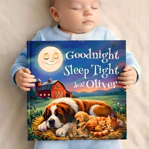 May include: A sleeping baby in blue pajamas holds a children's book titled "Goodnight Sleep Tight dear Oliver." The book cover features a full moon, a red barn, and a dog with puppies and kittens.