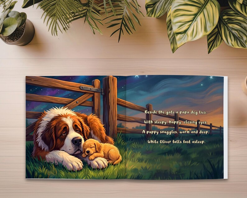 May include: A children's book illustration depicts a large brown and white dog lying in green grass next to a wooden fence. A smaller, golden puppy sleeps beside the larger dog. Text on the page reads: "Beside the gate a papa dog lies."